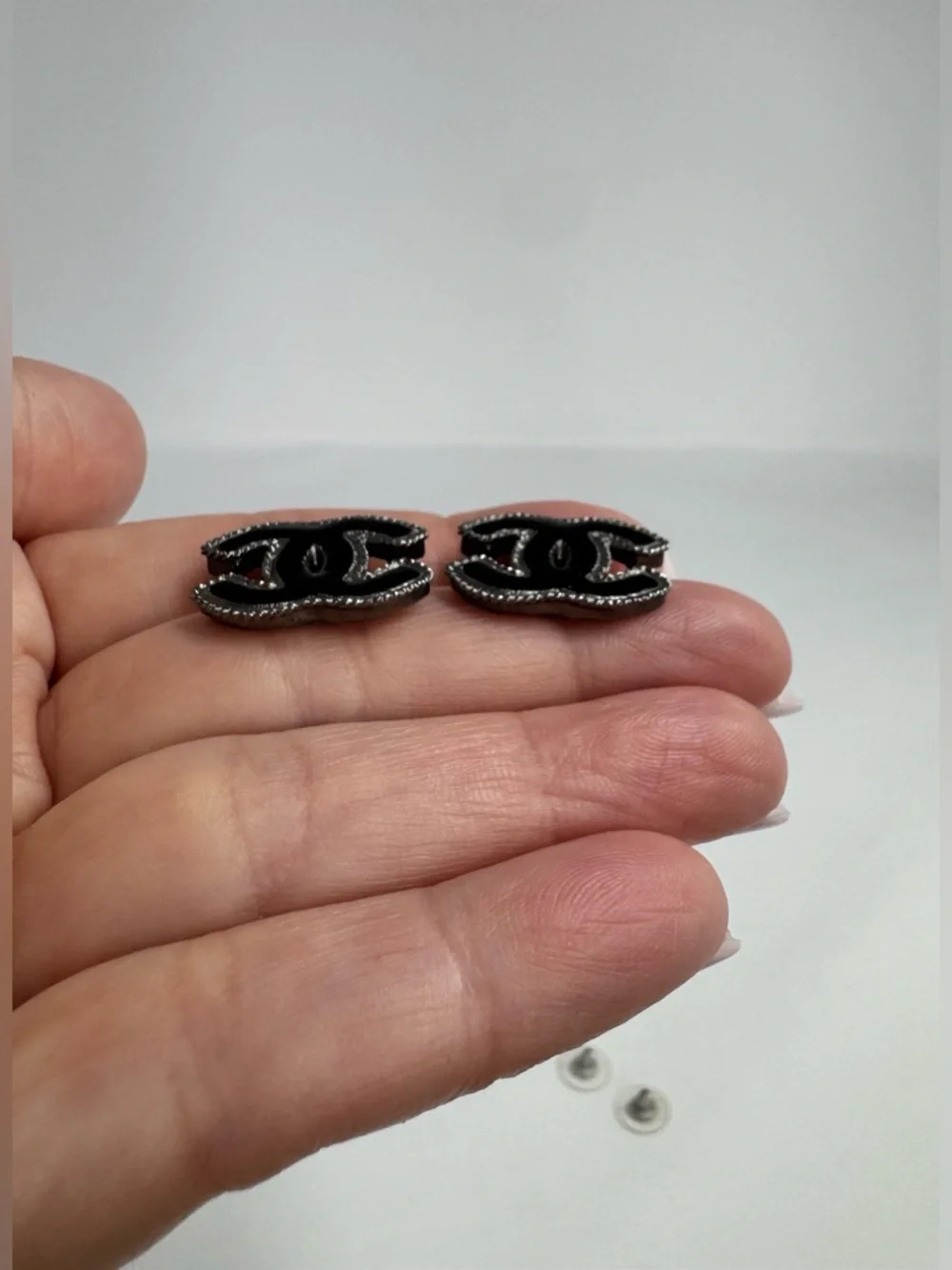 Authentic CHANEL Black Enamel CC Stud Earrings with Silver-Toned Trim - Picture 2 of 3